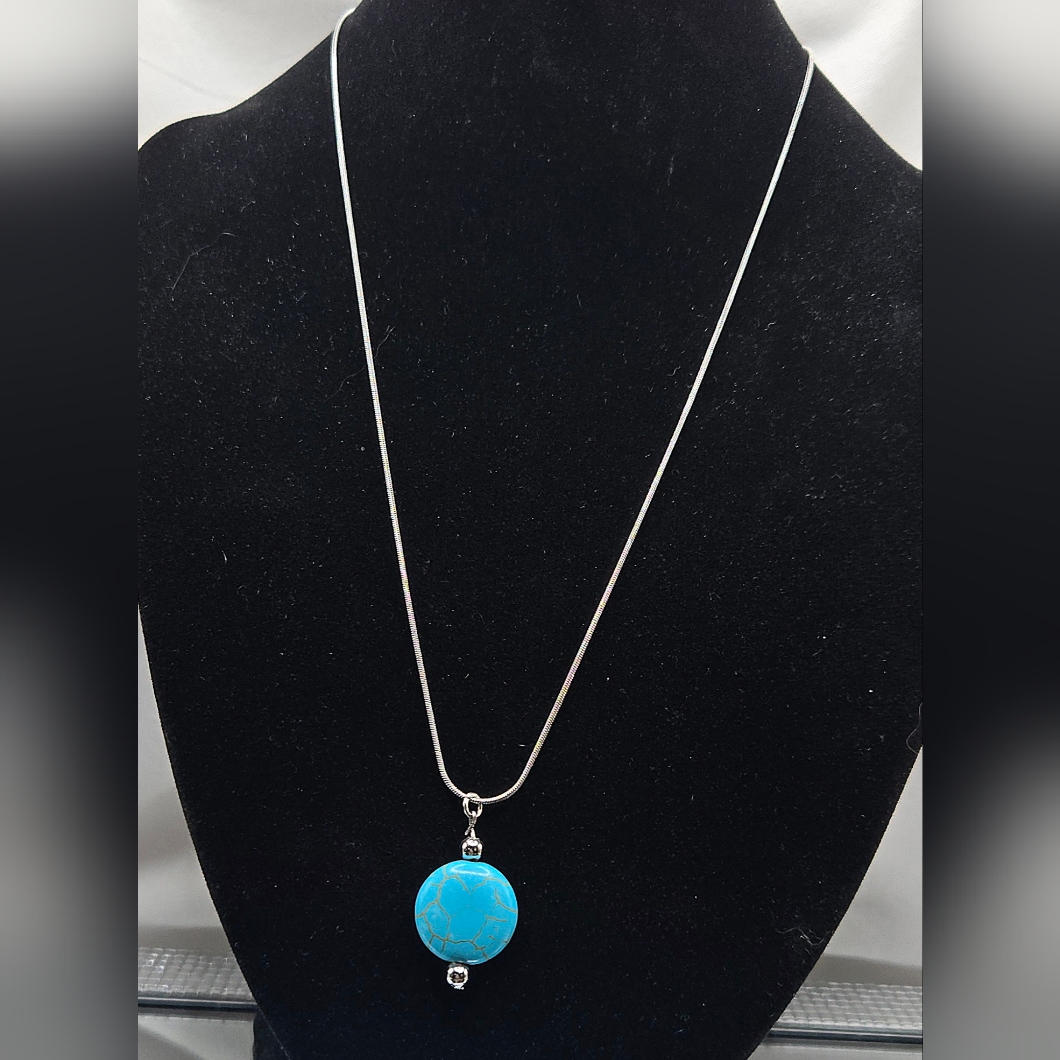 Elegant Silver Necklace With Turquoise Pendant